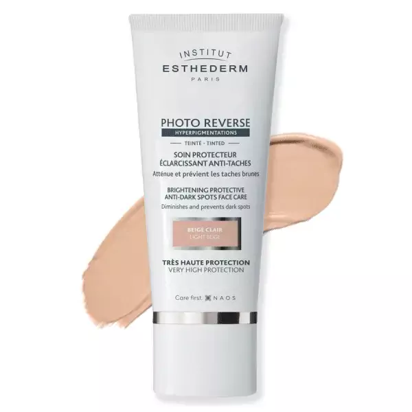 Крем при пигментации для лица Photo Reverse с тоном (Light Beige) Photo Reverse Brightening Protective Anti-Dark Spots Face Care Light Beige Institut Esthederm 50 мл — фото №1